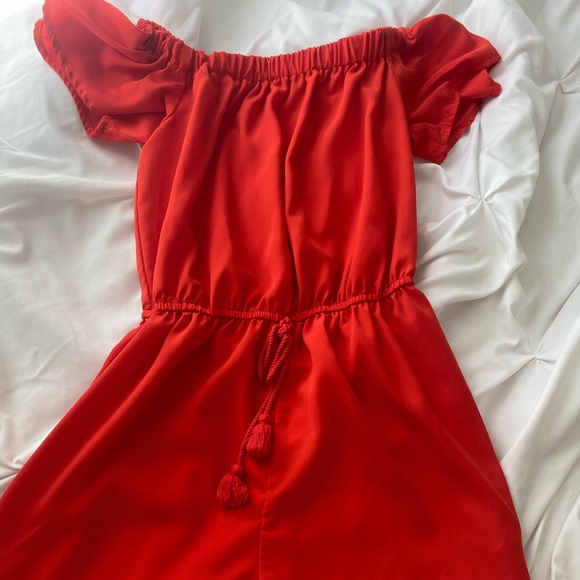 A red off the shoulders romper - Picture 2 of 2